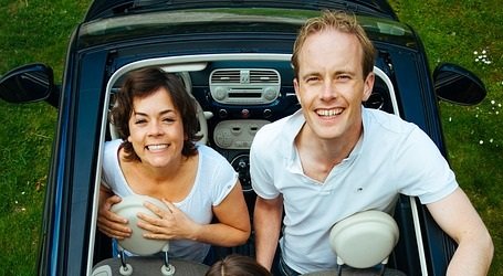 Family in a small car